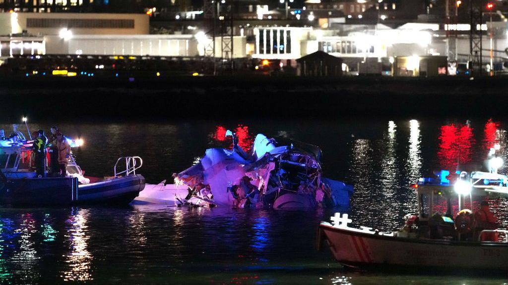 Emergency units respond after a passenger aircraft collided with a helicopter in the Potomac River near Ronald Reagan Washington Airport on January 30, 2025 