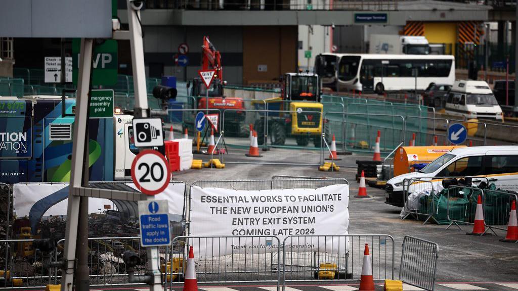 A sign alerts travellers arriving at the Port of Dover on the south-east coast of England on July 31, 2024, of the construction works underway to facilitate the new European Union Entry Exit System, due to open in late 2024.