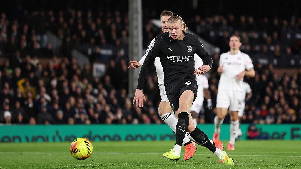 Haaland with the ball during the Fulham v Manchester City match.