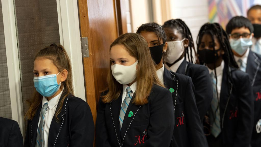 School pupils line up