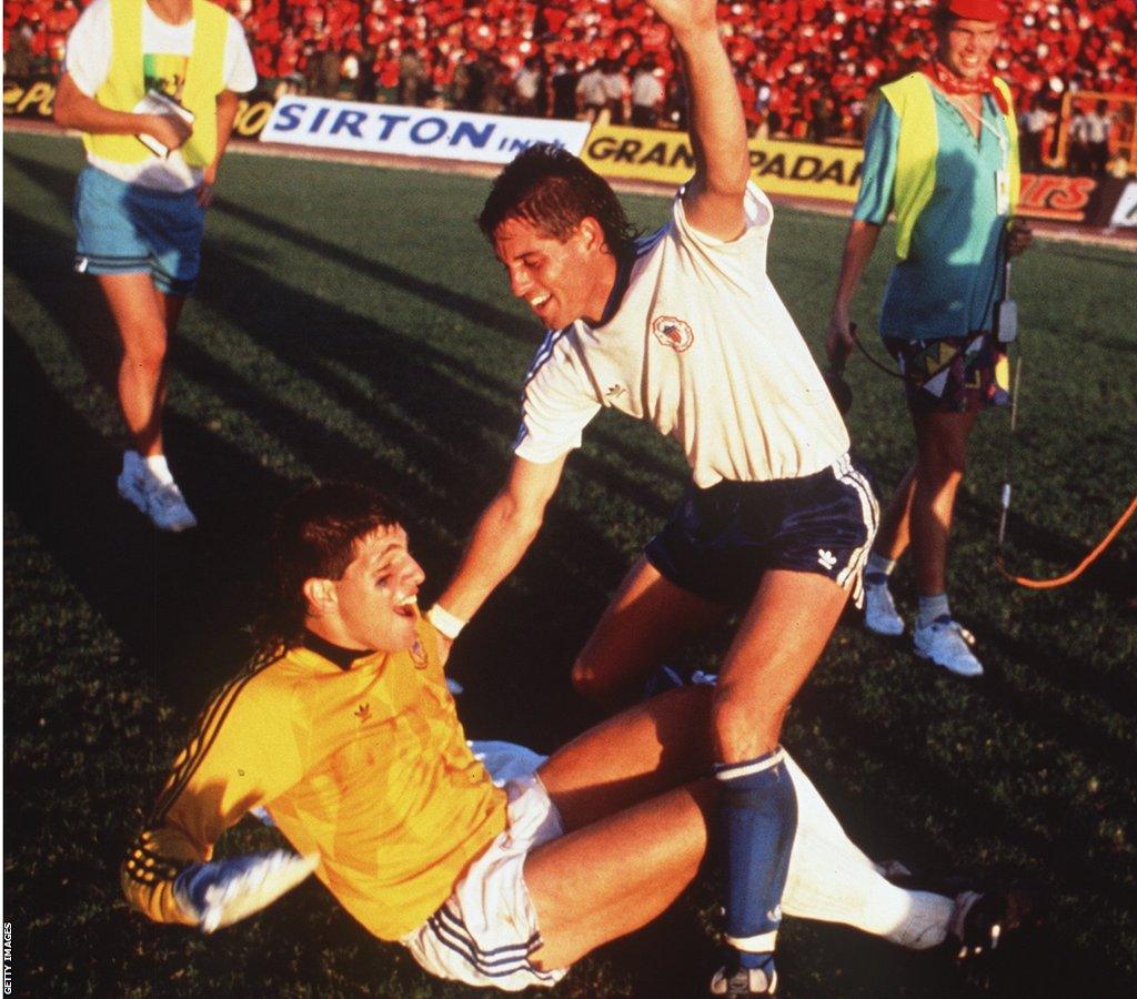 Tony Meola and John Harkes celebrate beating Trinidad and Tobago to make the World Cup