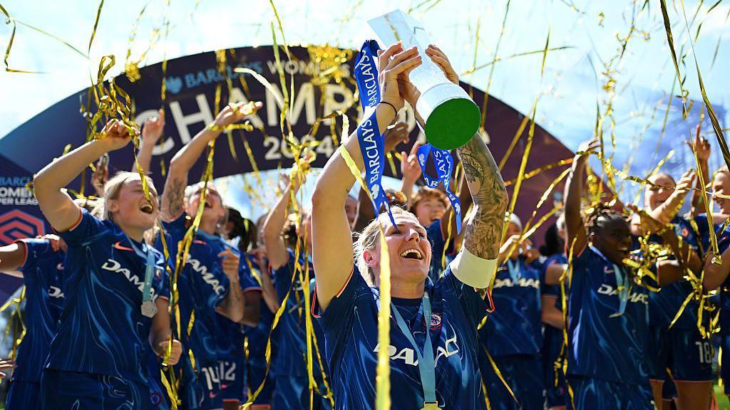 Millie Bright with FA Cup trophy in 2025.