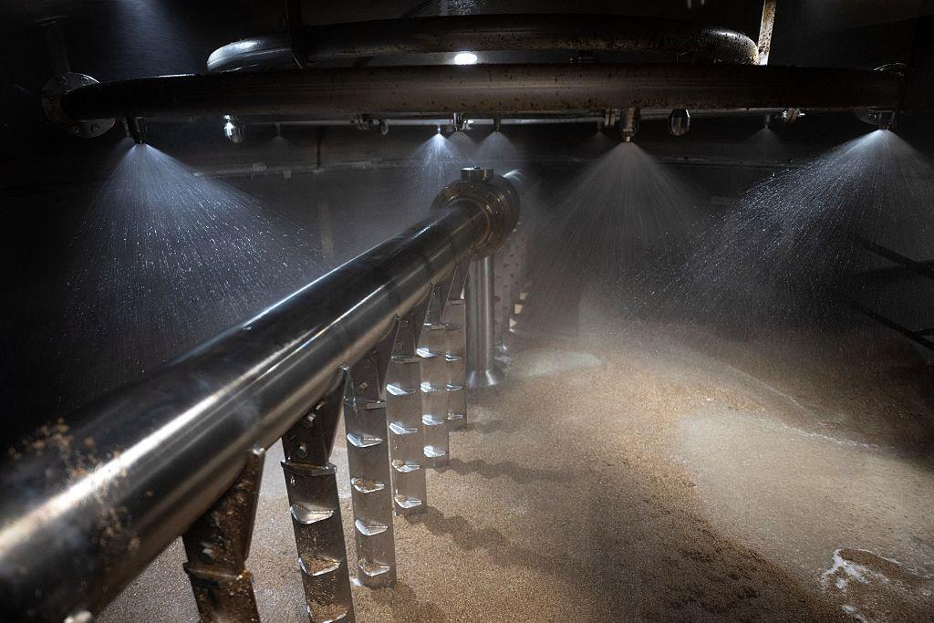 Hot water is mixed with crushed barley in the Mash Tun during the production of single malt scotch whisky in Tobermory