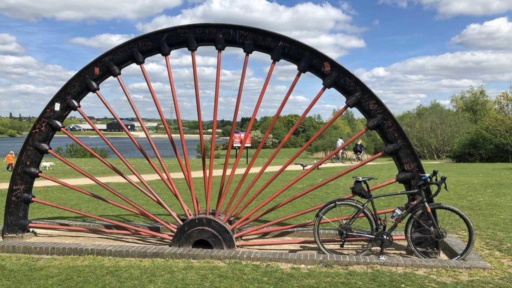 Commemorative colliery winding wheel Manvers Lake
