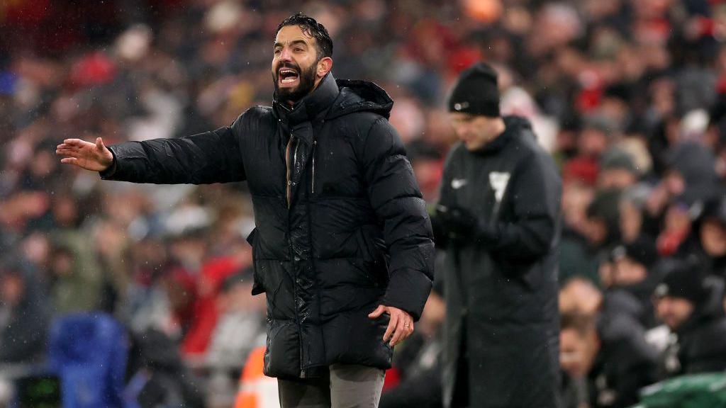 Manchester United Head Coach Ruben Amorim issues instructions to his players