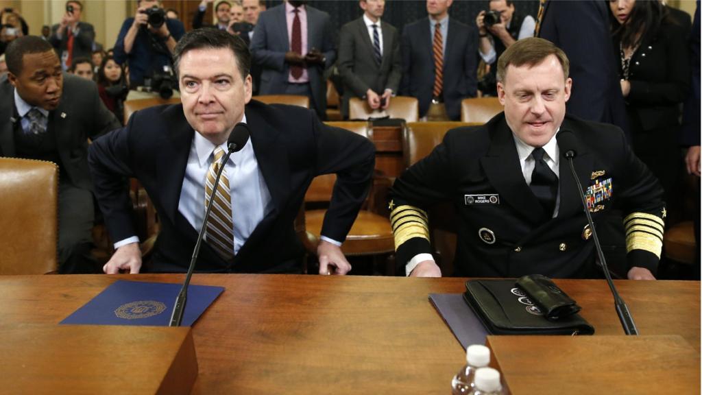 FBI Director James Comey (L) and National Security Agency Director Mike Rogers