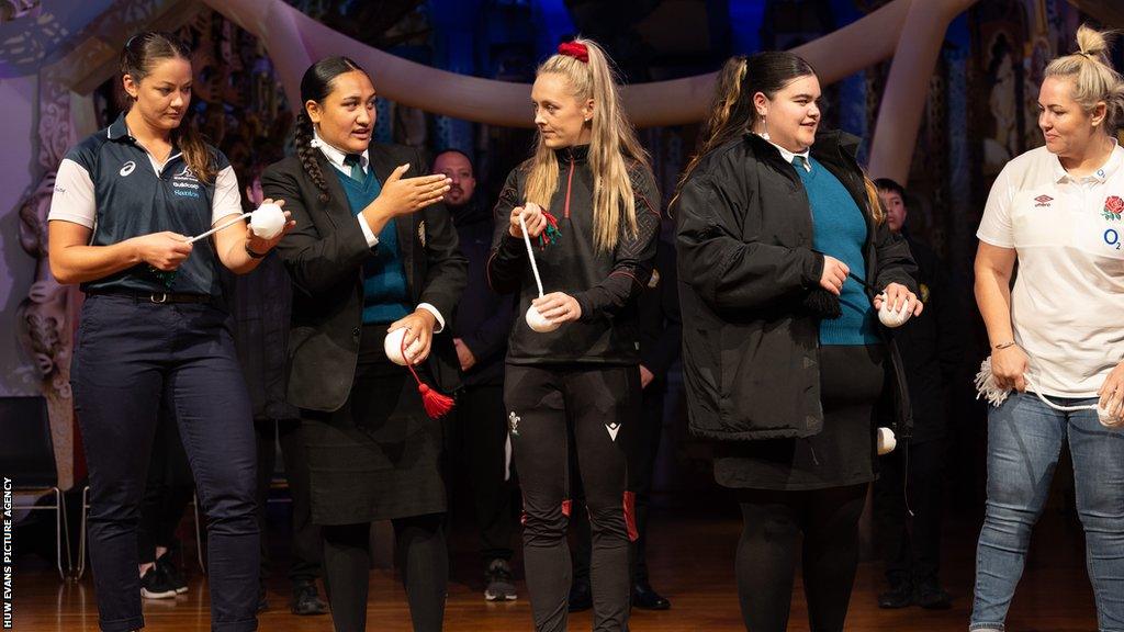 Michaela Leonard, Hannah Jones and Marlie Packer put their poi skills to the test