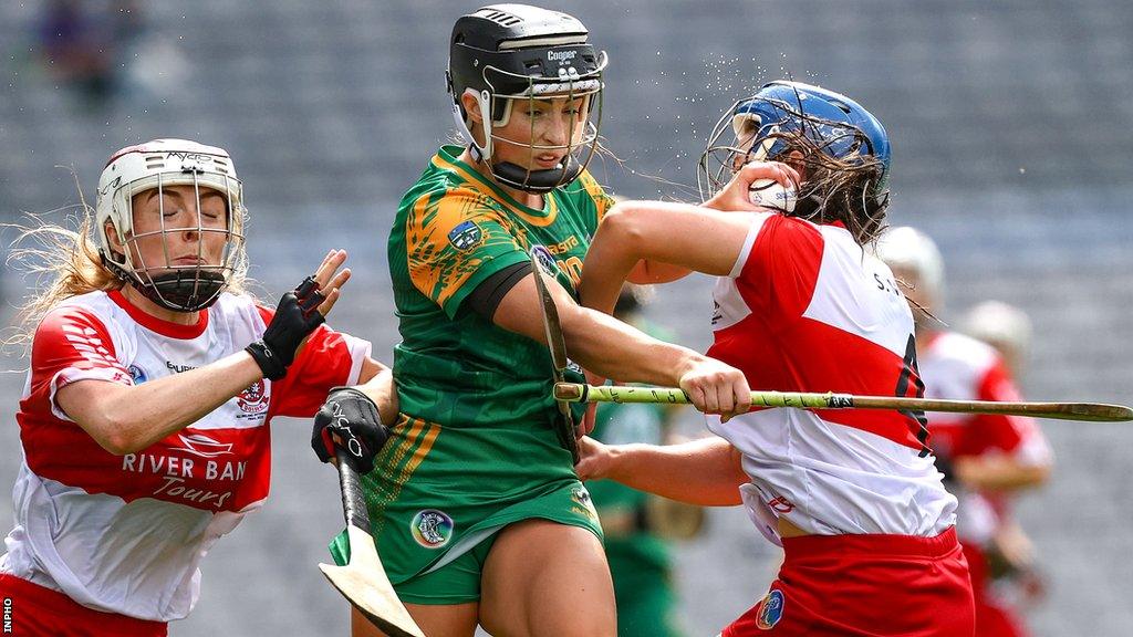 Derry pair Lauren McKenna and Sinead McGill close in on Amy Gaffney in Sunday's final