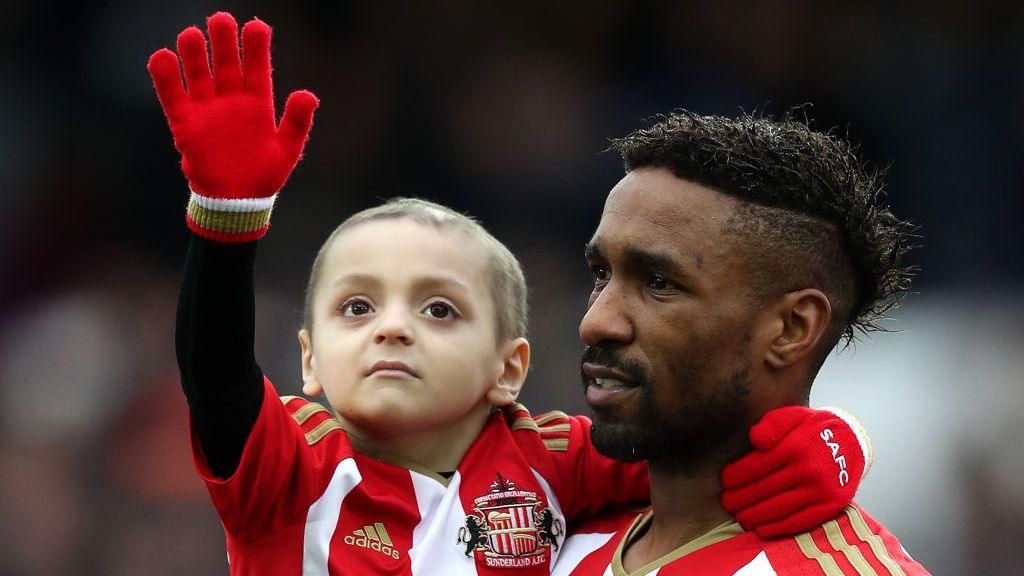 Jermain Defoe and Bradley Lowery