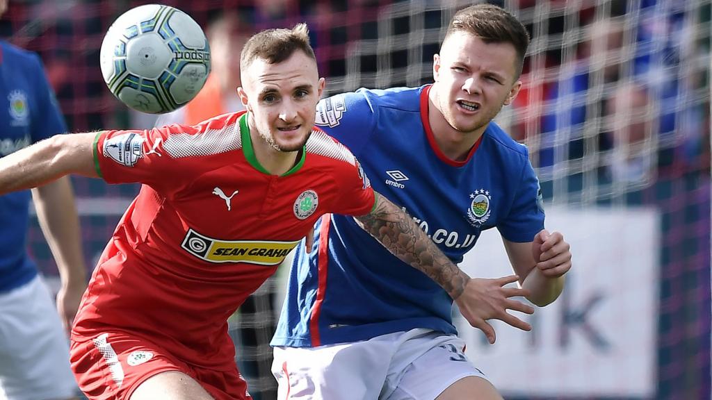 Action from Cliftonville vs Linfield