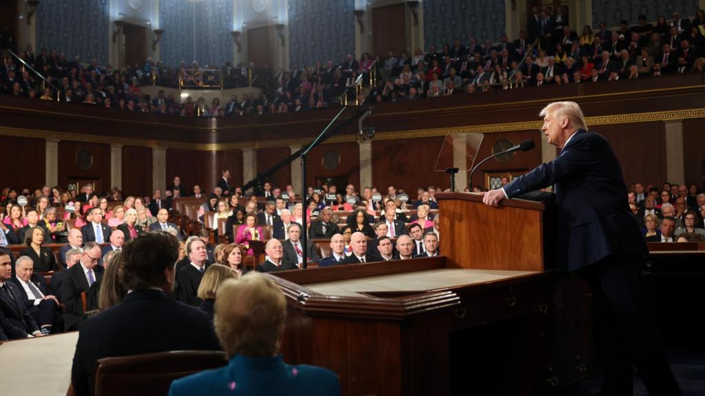 US President Donald Trump (R) addresses a joint session of the United States Congress at the US Capitol in Washington, DC, USA, on 04 Marc