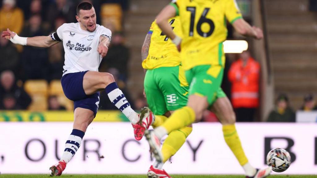 Preston North End striker Milutin Osmajic (left) shoots the ball into the Norwich City net to open the scoring.