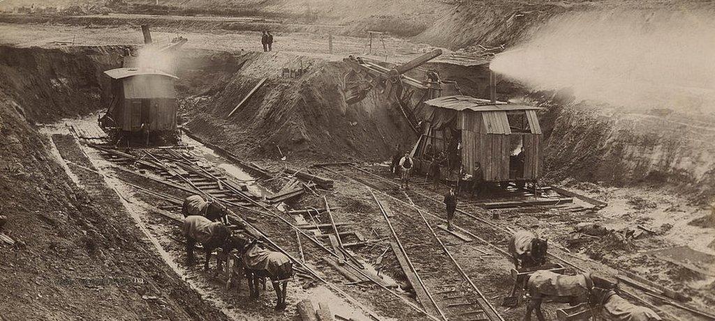 Workers stop for a meal in the cutting at Irlam, Salford, Greater Manchester, during the construction of the Manchester Ship Canal, circa 1890