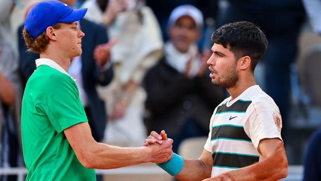Jannik Sinner and Carlos Alcaraz shake hands