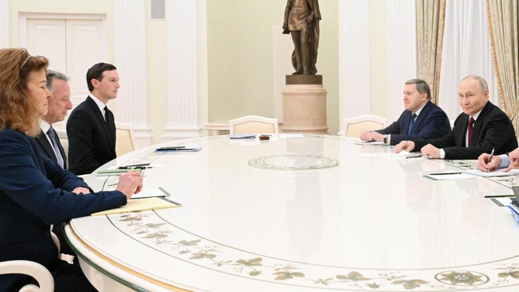 Russian President Vladimir Putin sat a a large white table opposite Steve Witkoff and Jared Kushner at the Kremlin
