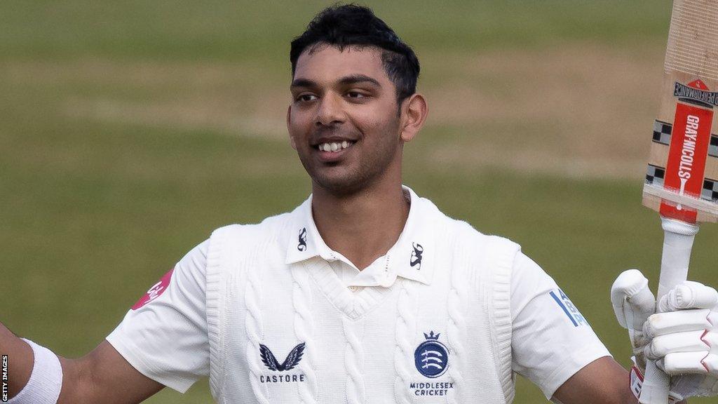 Middlesex opener Nathan Fernandes celebrates scoring a century