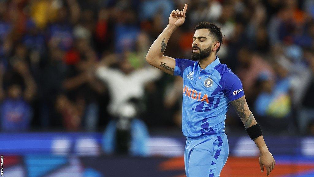 Virat Kohli celebrates helping India beat Pakistan in the Men's T20 World Cup in 2022