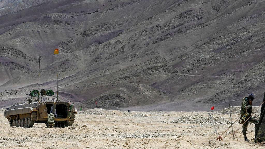 This picture taken on May 19, 2024, shows an armoured vehicle of the Indian army at a military camp in Eastern Ladakh. Lines on a map once meant little to India's Tibetan herders of the high Himalayas, expertly guiding their goats through even the harshest winters to pastures on age-old seasonal routes. That stopped in 2020, after troops from nuclear-armed rivals India and China clashed in bitter hand-to-hand combat in the contested high-altitude border lands of Ladakh. (Photo by TAUSEEF MUSTAFA / AFP) (Photo by TAUSEEF MUSTAFA/AFP via Getty Images)