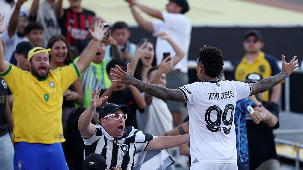 Igor Jesus celebrates his winning Club World Cup goal v PSG with the fans