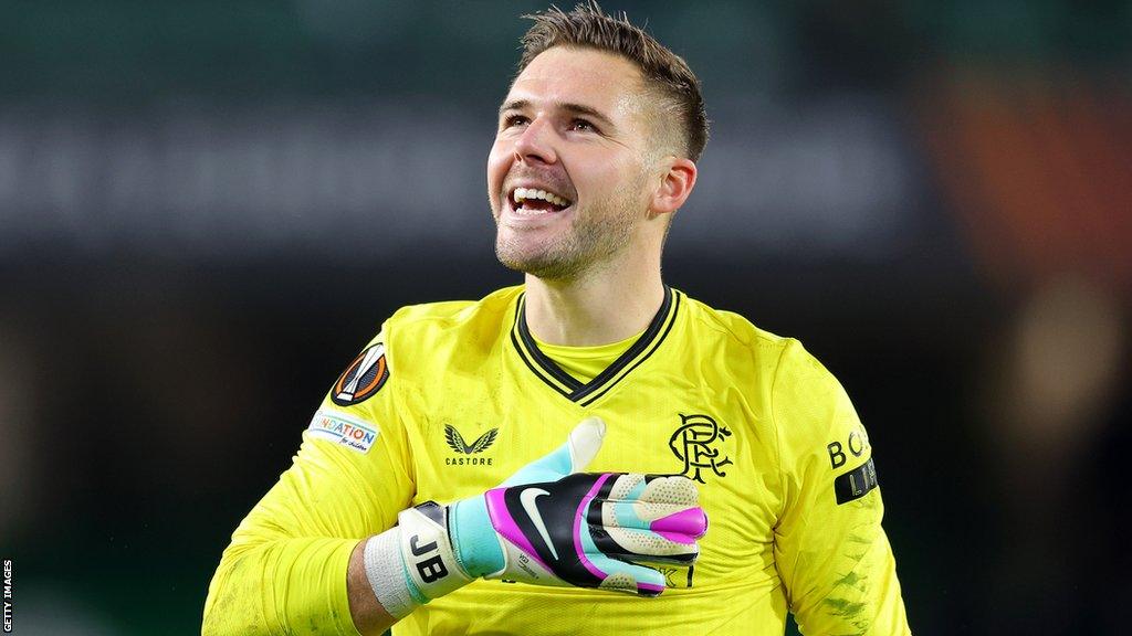 Jack Butland smiles while playing for Rangers