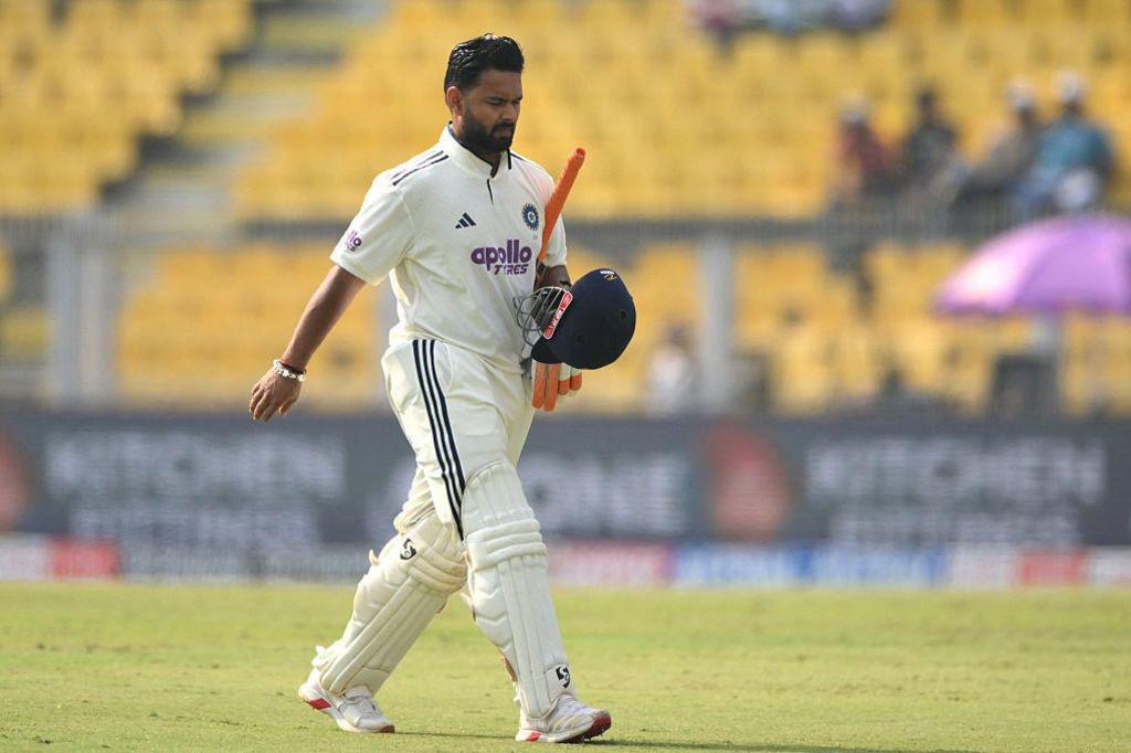 India's Rishabh Pant walks back to the pavilion after his dismissal during the third day of the second Test cricket match between India and South Africa at the Barsapara Cricket Stadium in Guwahati on November 24, 2025.