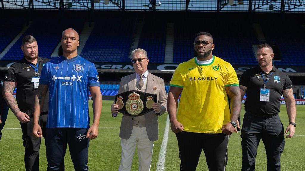 Fabio Wardley in an Ipswich shirt and Jarrell Miller in a Norwich shirt