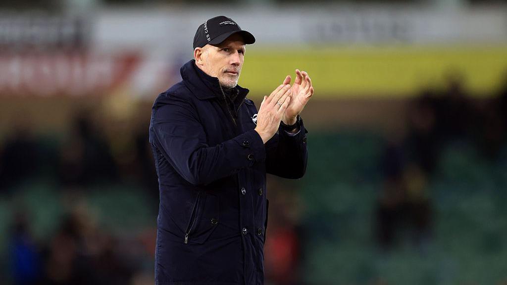 Norwich boss Philippe Clement applauds after the team's win over QPR.