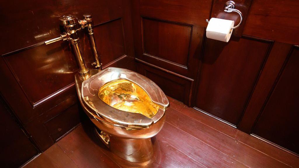 golden toilet.