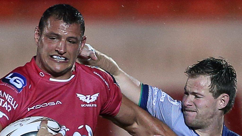 Aaron Shingler is tackled by Connacht's Kieran Marmion