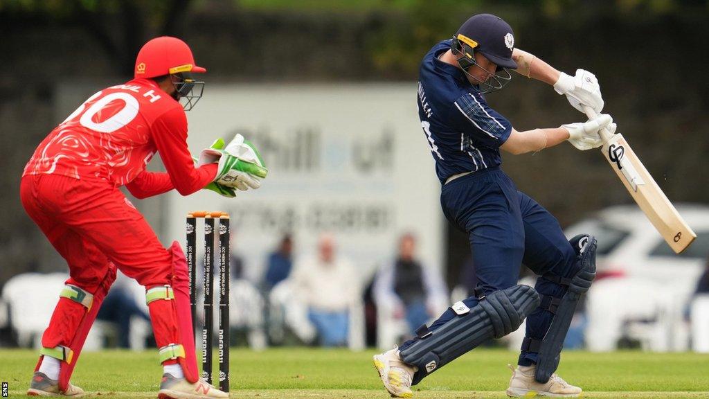 Scotland's Brandon McMullen (right) in action against Denmark