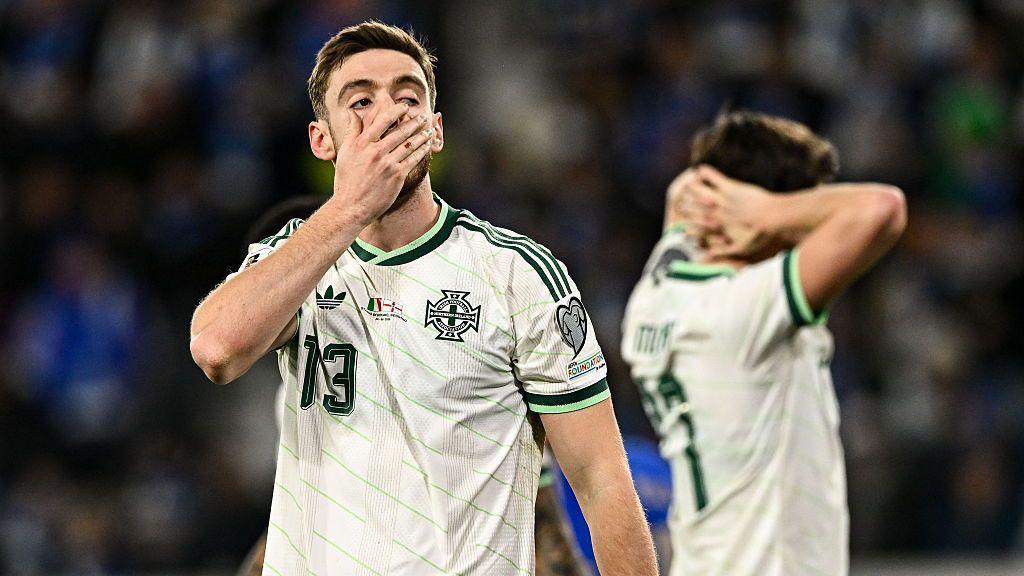 Ruairi McConville of Northern Ireland looks sad after losing to italy