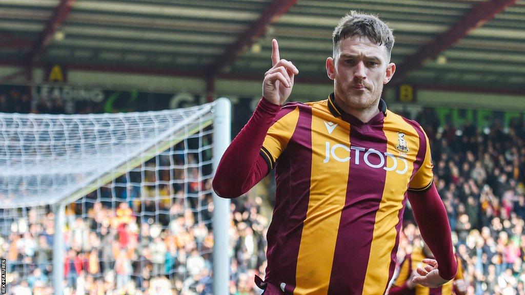 Andy Cook celebrates a goal for Bradford City