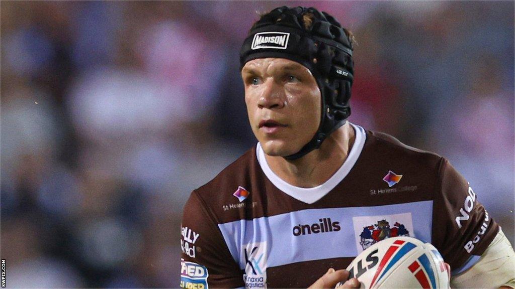 Jonny Lomax carries the ball for St Helens