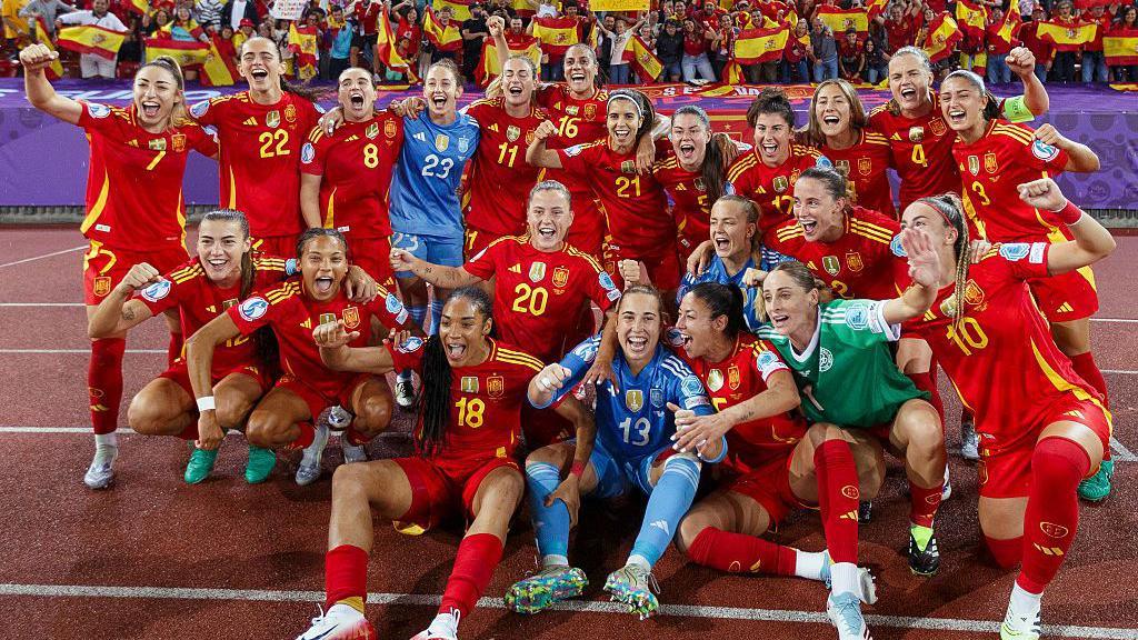 Spain players celebrate their victory