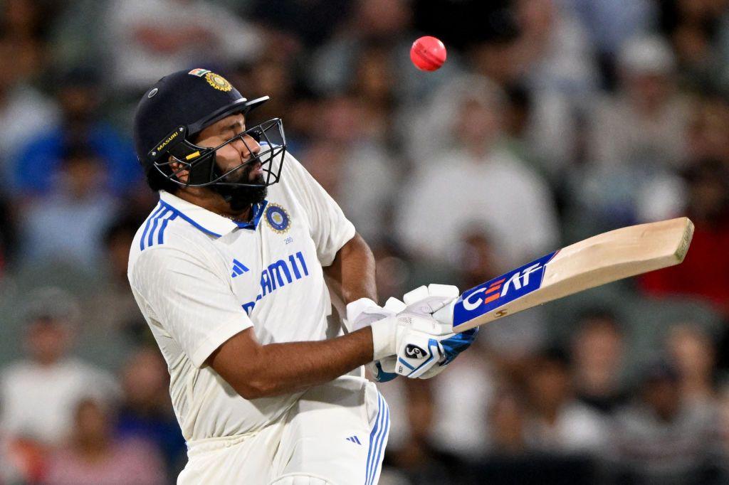 Indian batsman Rohit Sharma is hit by the ball on the second day of the second Test cricket match between Australia and India at the Adelaide Oval in Adelaide on December 7, 2024.