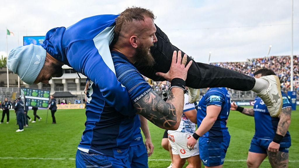 RG Snyman of Leinster carries Jamison Gibson-Park as they celebrate winning the United Rugby Championship final