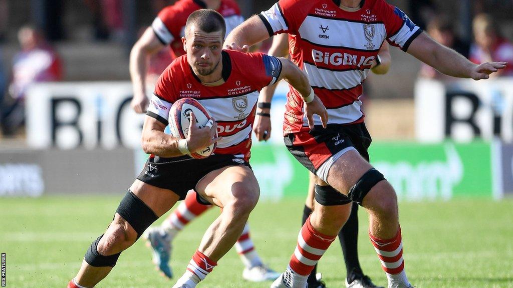 Reece Dunn runs with the ball in hand for Gloucester during the Premiership Rugby Cup win over Nottingham