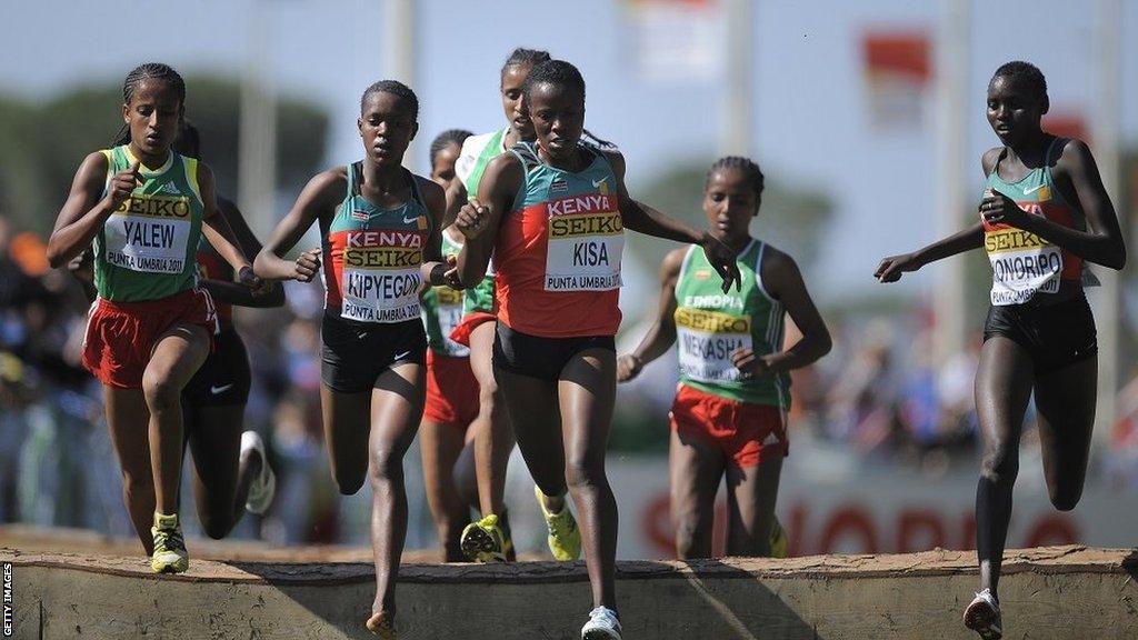 Faith Kipyegon running barefoot at the 2011 World cross country Championships in Spain