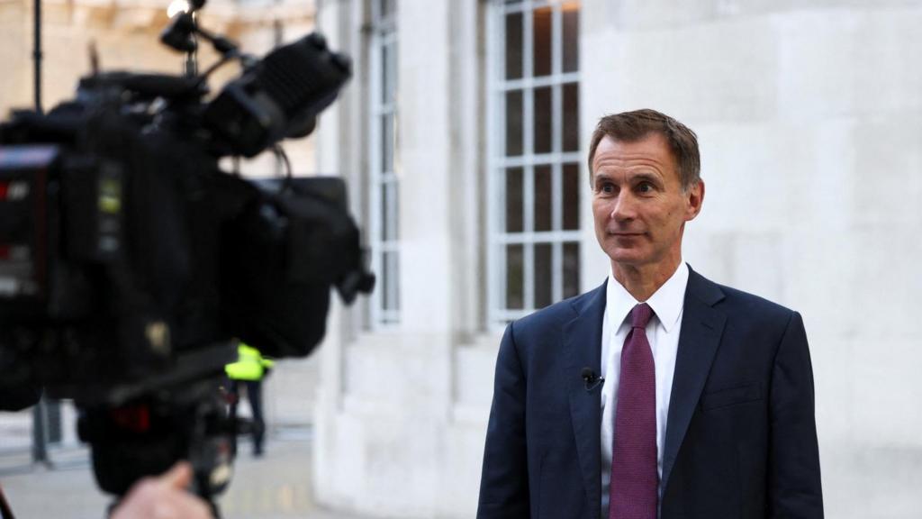 Jeremy Hunt speaks to the media