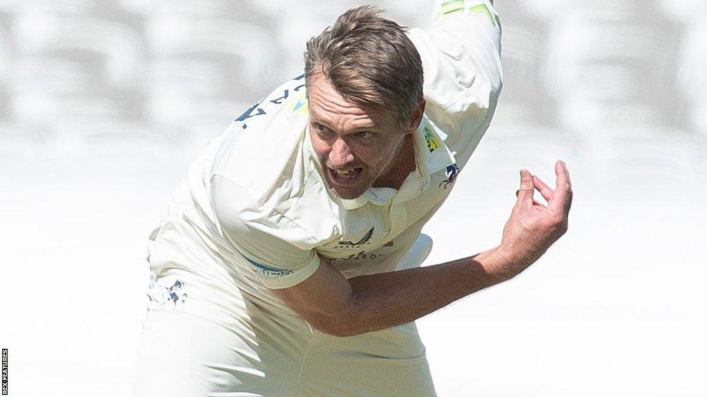 Michael Hogan bowling for Kent