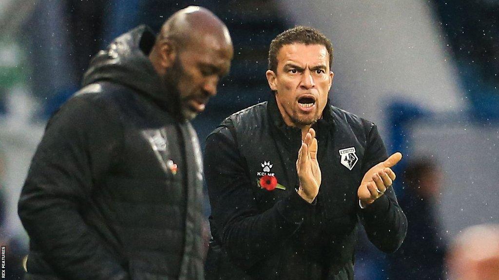 Huddersfield Town manager Darren Moore (left) and Watford head coach Valerian Ismael