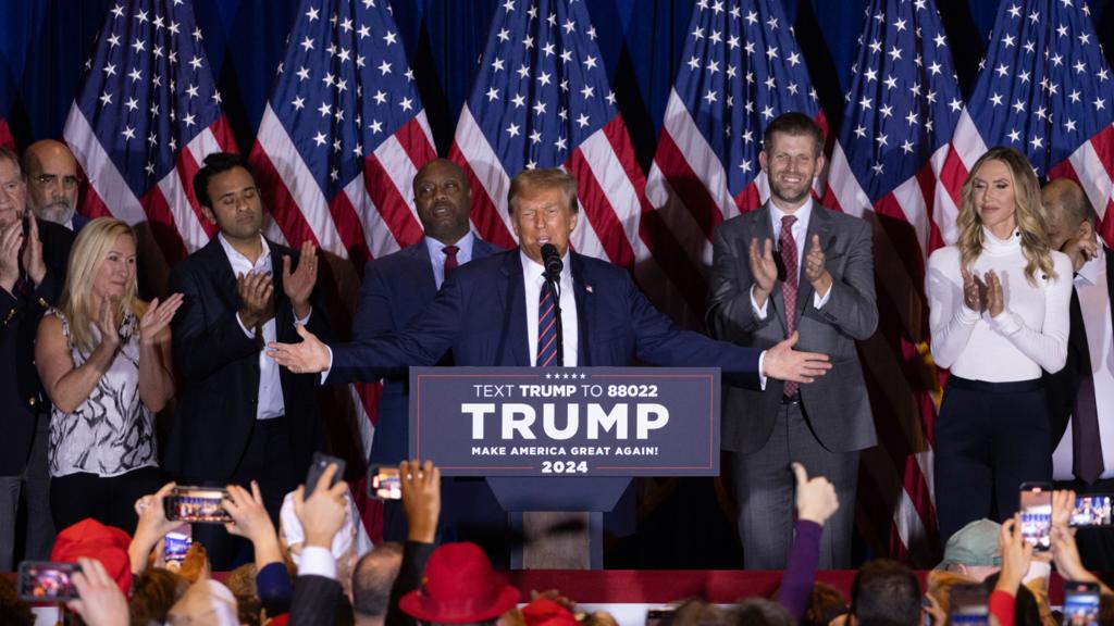 Donald Trump delivers a victory speech after winning the New Hampshire primary