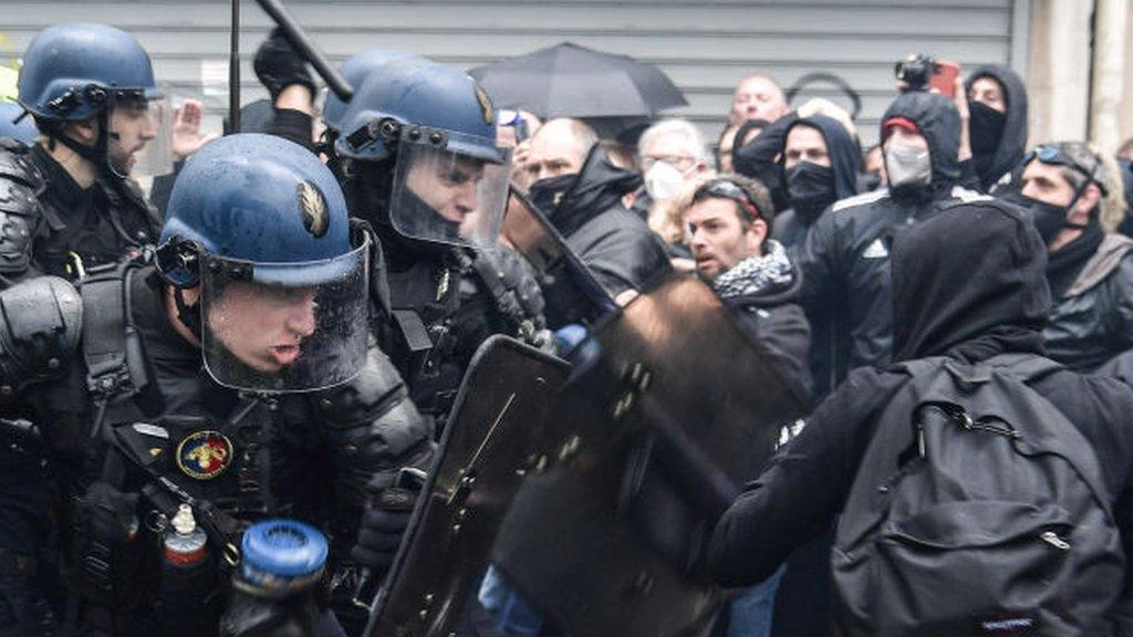 Police clash with protesters in Paris