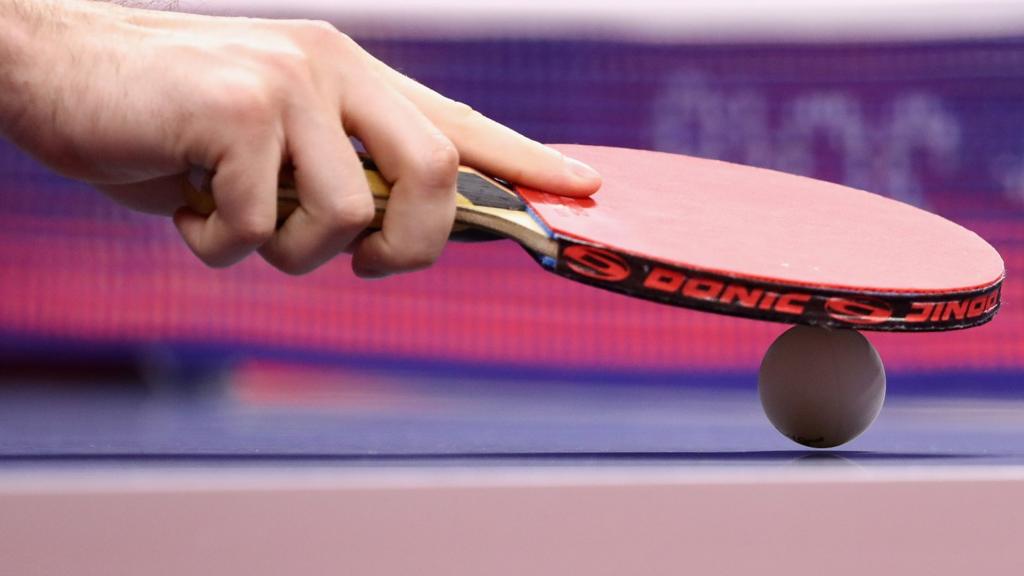 table tennis bat and ball