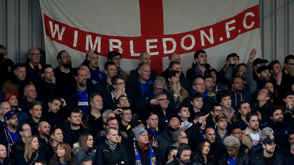 AFC Wimbledon supporters look on