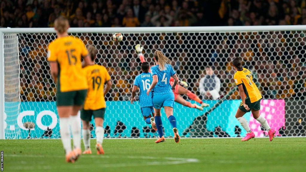 Australia's Sam Kerr scores against England