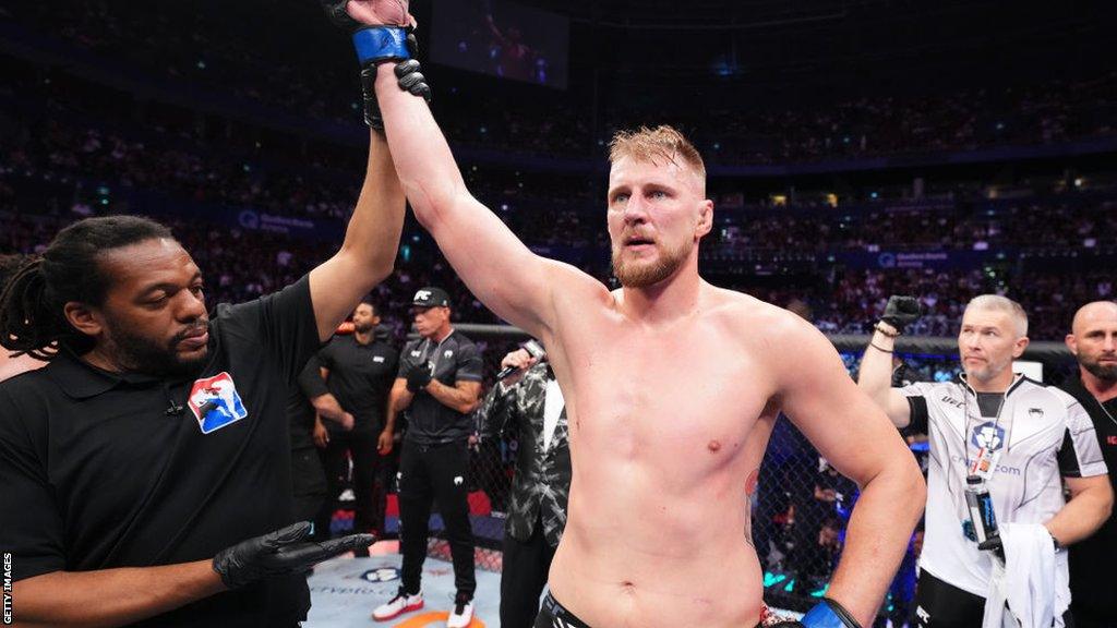 Alexander Volkov celebrates after defeating Tai Tuivasa