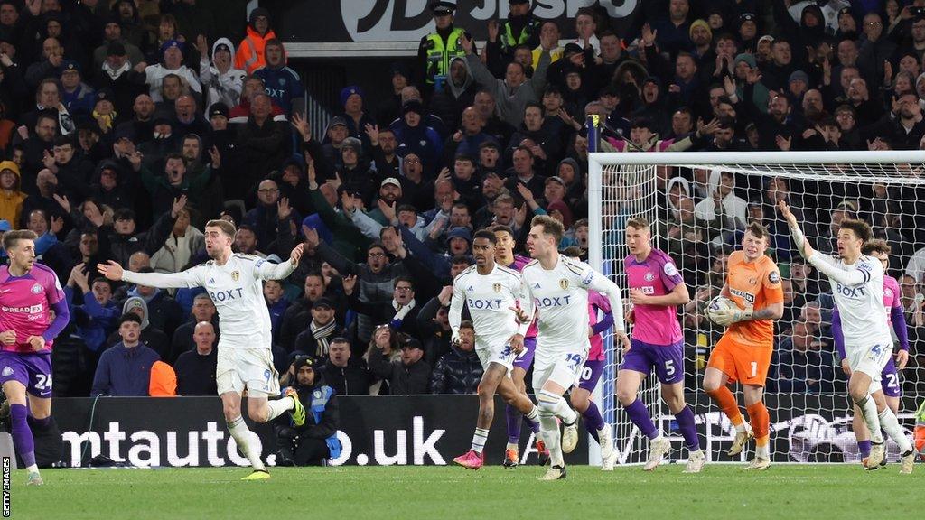 : Leeds players appeal for a handball during to the Sky Bet Championship match between Leeds United and Sunderland at Elland Road on April 9, 2024 in Leeds, United Kingdom