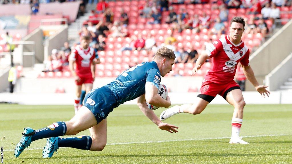 Warrington Wolves' Matty Nicholson scores their first try against Salford