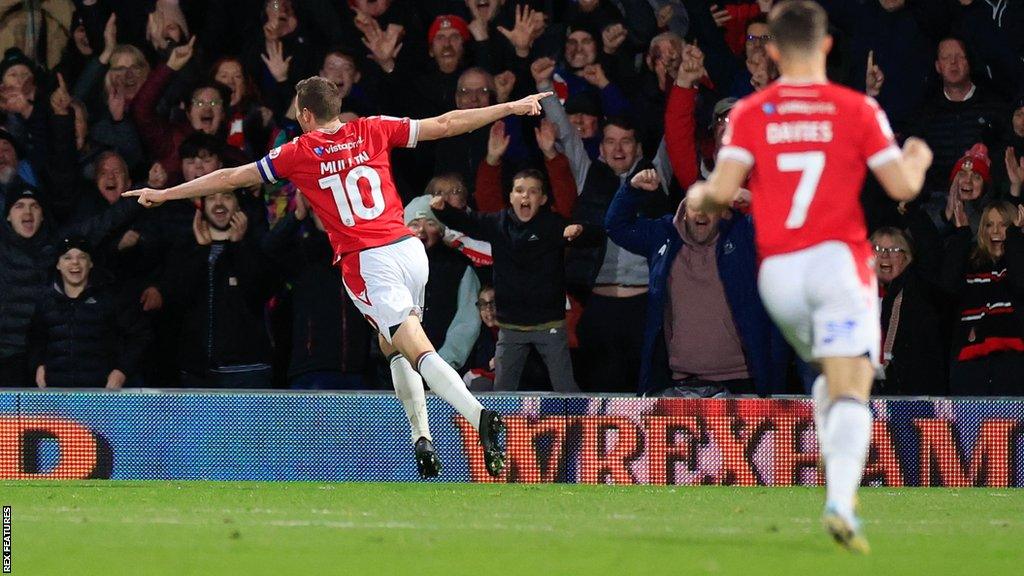 Paul Mullin celebrates his second goal